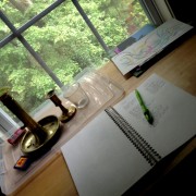picture of desk, notebook and pen
